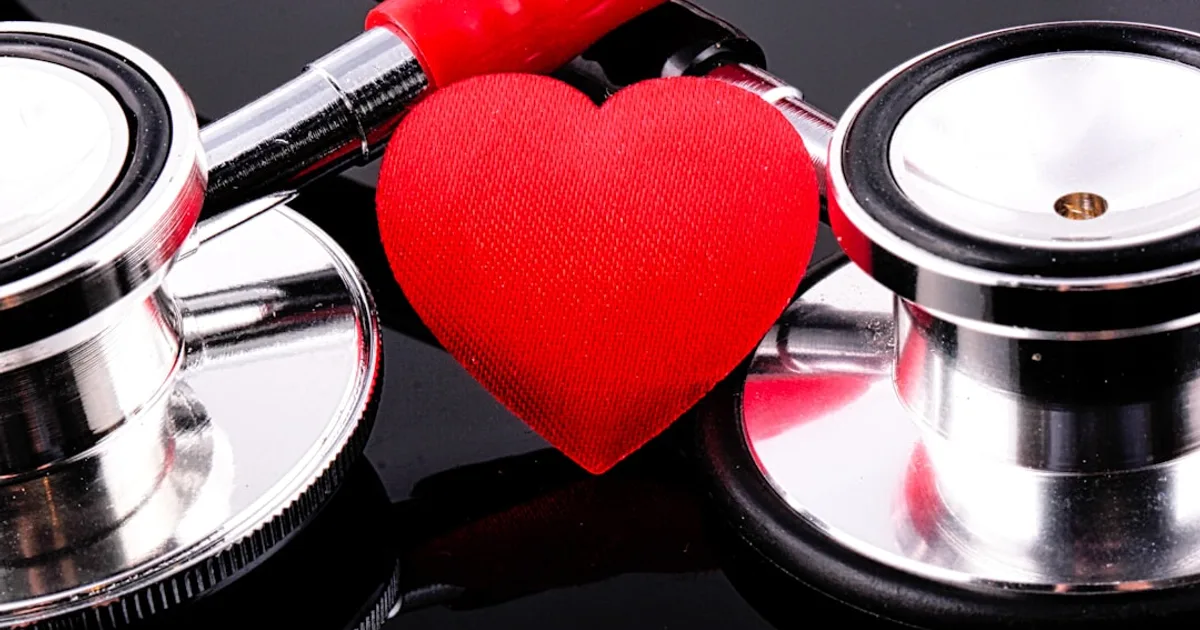 a stethoscope and a heart on a table